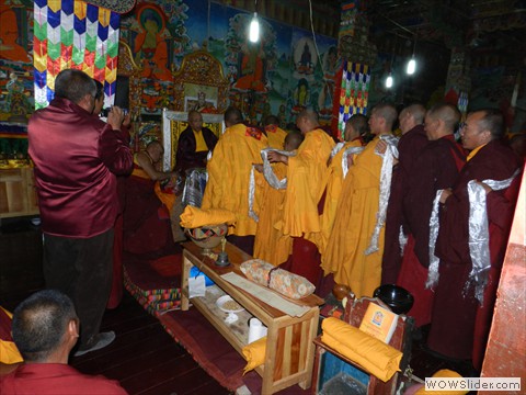 Korche monks make offerings to Lama Norlha Rinpoche